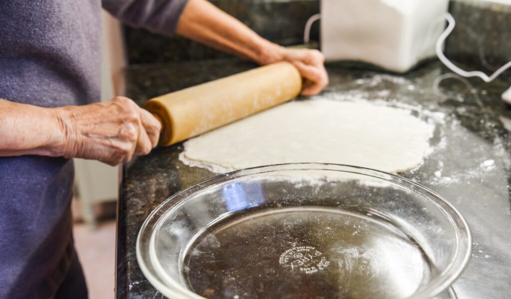 a talented home baker rolls out dough for a pie cr 2021 08 31 23 11 49 utc